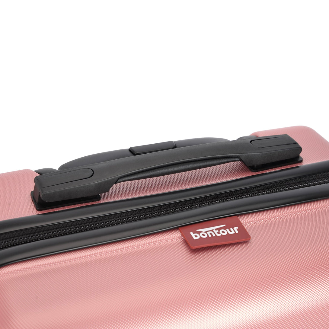 BONTOUR “spinner” közepes duplakerekes gurulós bőrönd, rolsegold-VASBÚTOR